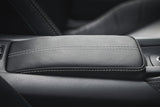 Padded armrest for the central console