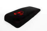 Padded armrest for the center console