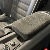 Padded armrest for the center console