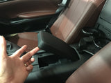 Padded armrest for central console