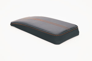 Padded armrest for the central console